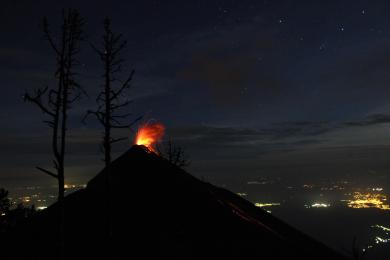 30.05.2015: Erupting Vulcano Fuego at night, full moon, stars and flashes in the background - unbelievable Moment - Acatenango, Guatemala